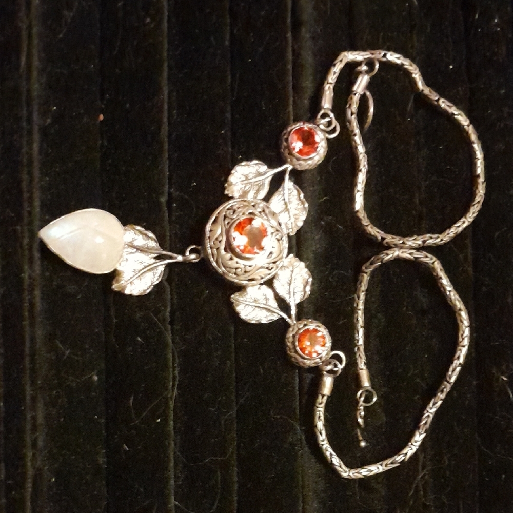 Elegant Silver and Red Gemstone Necklace